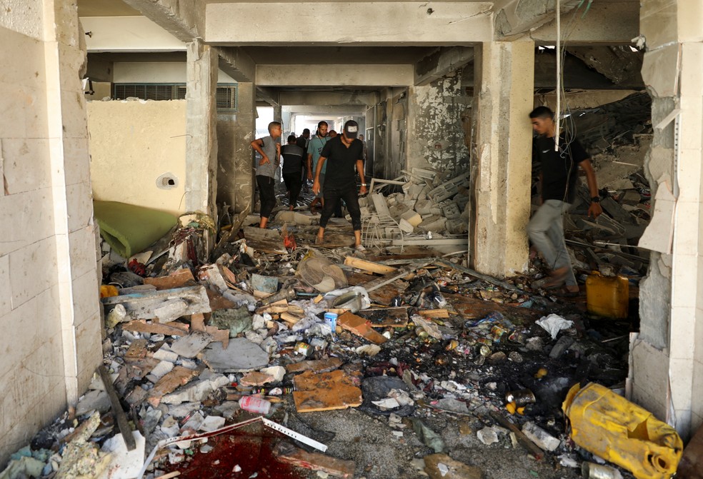 Ataque israelense em escola usada como abrigo em Gaza. — Foto: Reuters