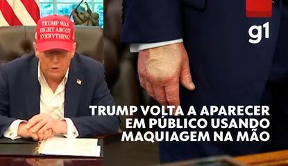 Trump volta a aparecer em público usando maquiagem na mão