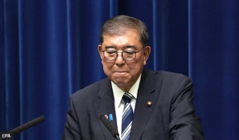 Ishiba enfrentava dificuldades para inspirar confiança em meio a pressões econômicas, derrotas eleitorais e tensões crescentes com a China — Foto: BBC