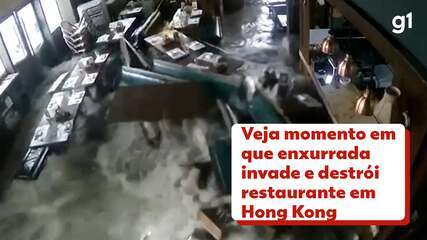 Veja momento em que enxurrada invade e destrói restaurante em Hong Kong 