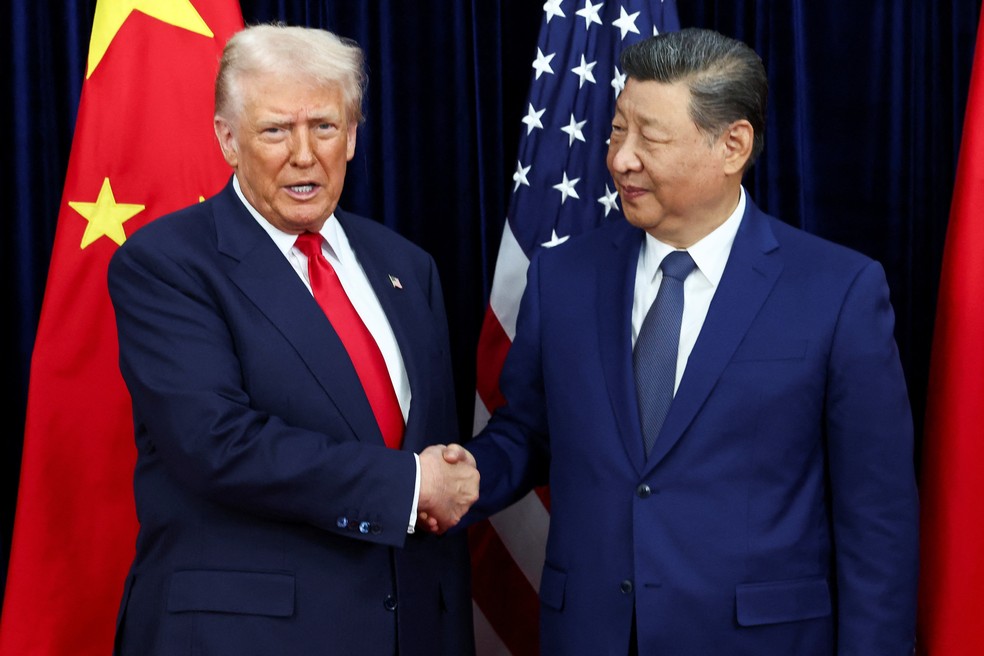 Donald Trump em encontro com Xi Jinping — Foto: REUTERS/Evelyn Hockstein