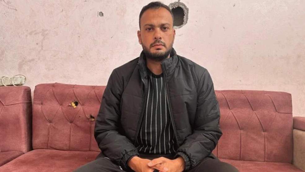 'Se eu caísse nas mãos do Hamas agora, eles gravariam um vídeo e me matariam na rua, com um tiro na cabeça', declarou o advogado Moumen al-Natour, de um local não revelado da Faixa de Gaza — Foto: BBC/ Reprodução