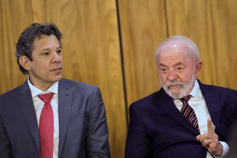 Haddad e Lula em evento no Planalto em 28 de julho de 2025 — Foto: REUTERS/Adriano Machado